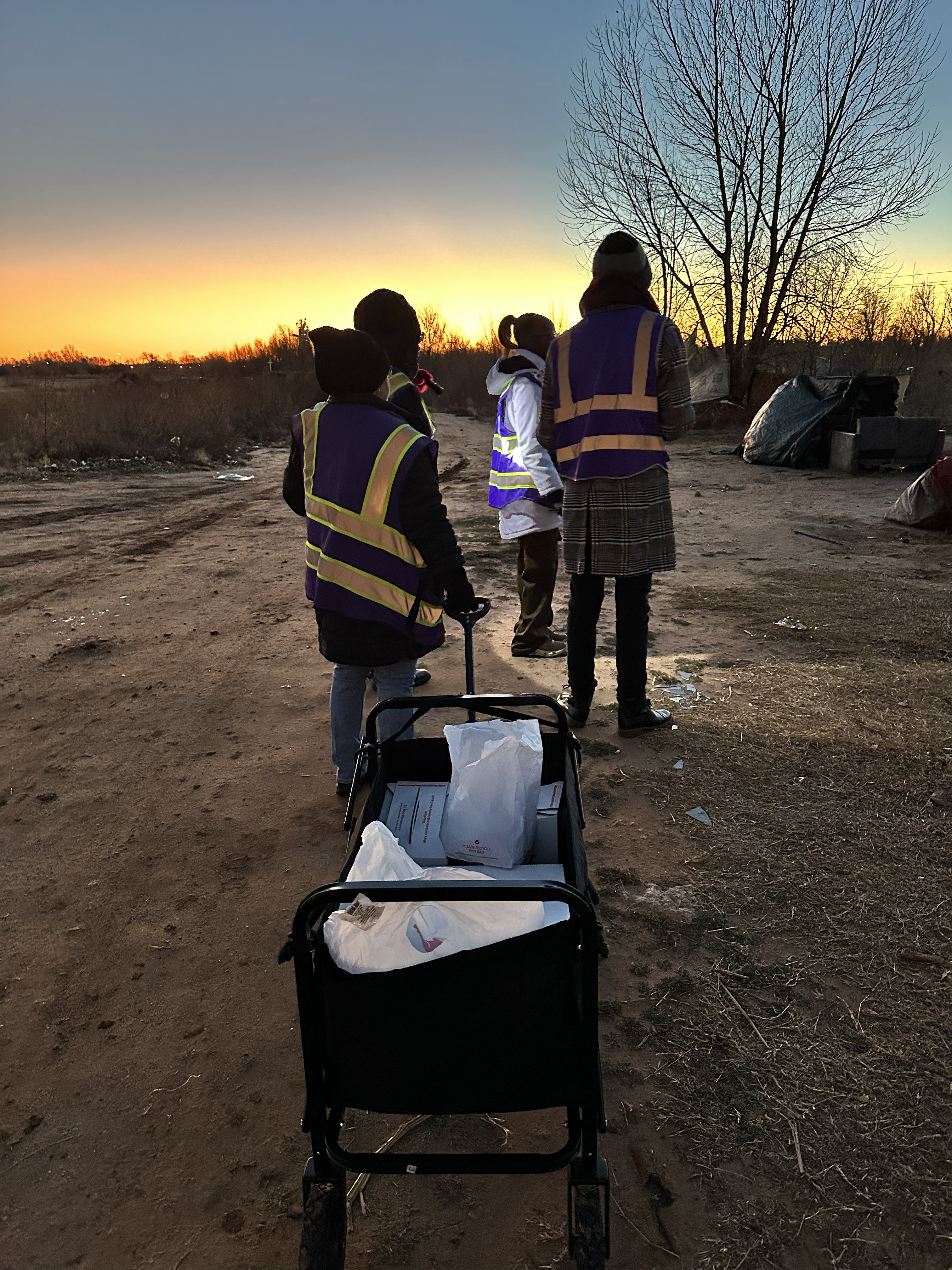 homelessness outreach worker outside at sunrise