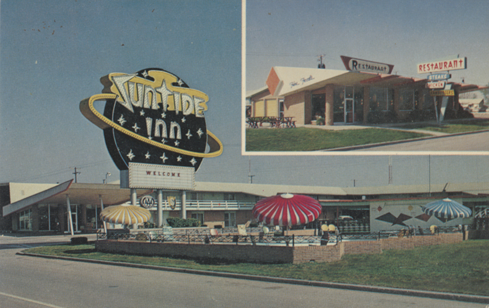 businesses and outdoor signs on route 66 in okc (historical photo)