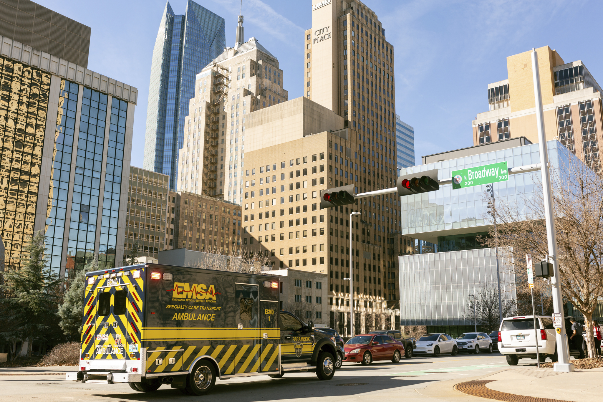 EMSA ambulance driving near downtown OKC