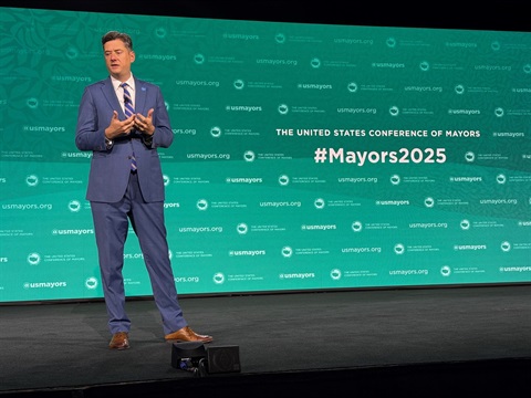 Mayor Holt talking on stage at US Conference of Mayors