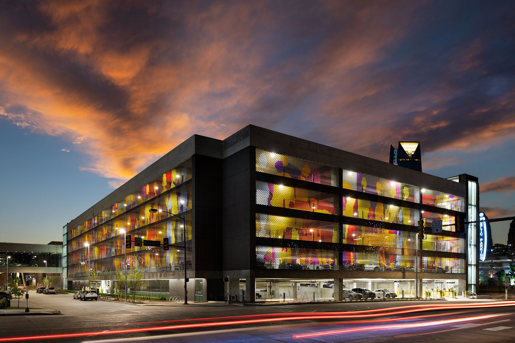 parking garage with colorful metal design on each level