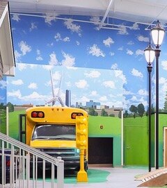 school bus mural inside large room