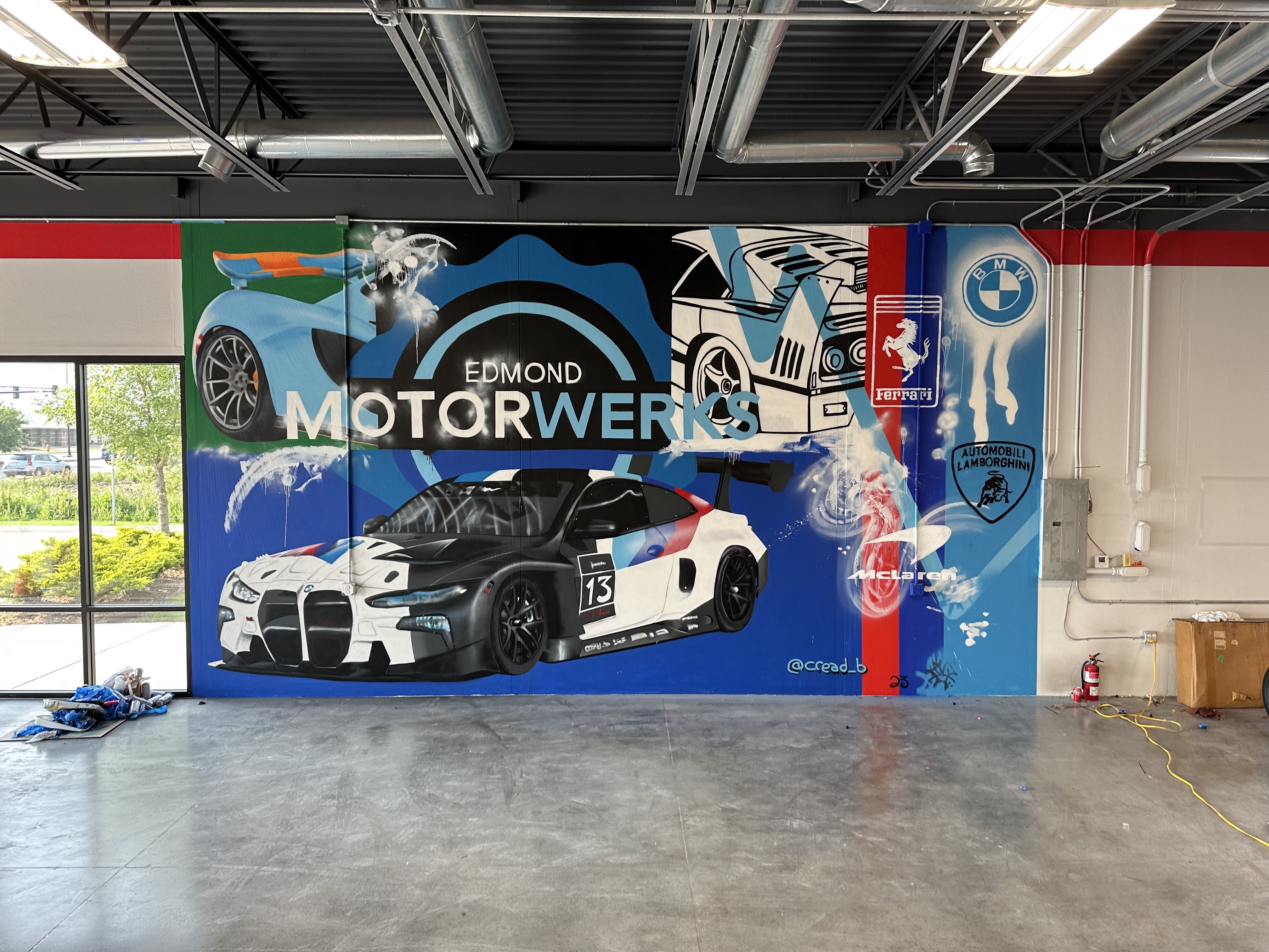 spray painted mural of cars