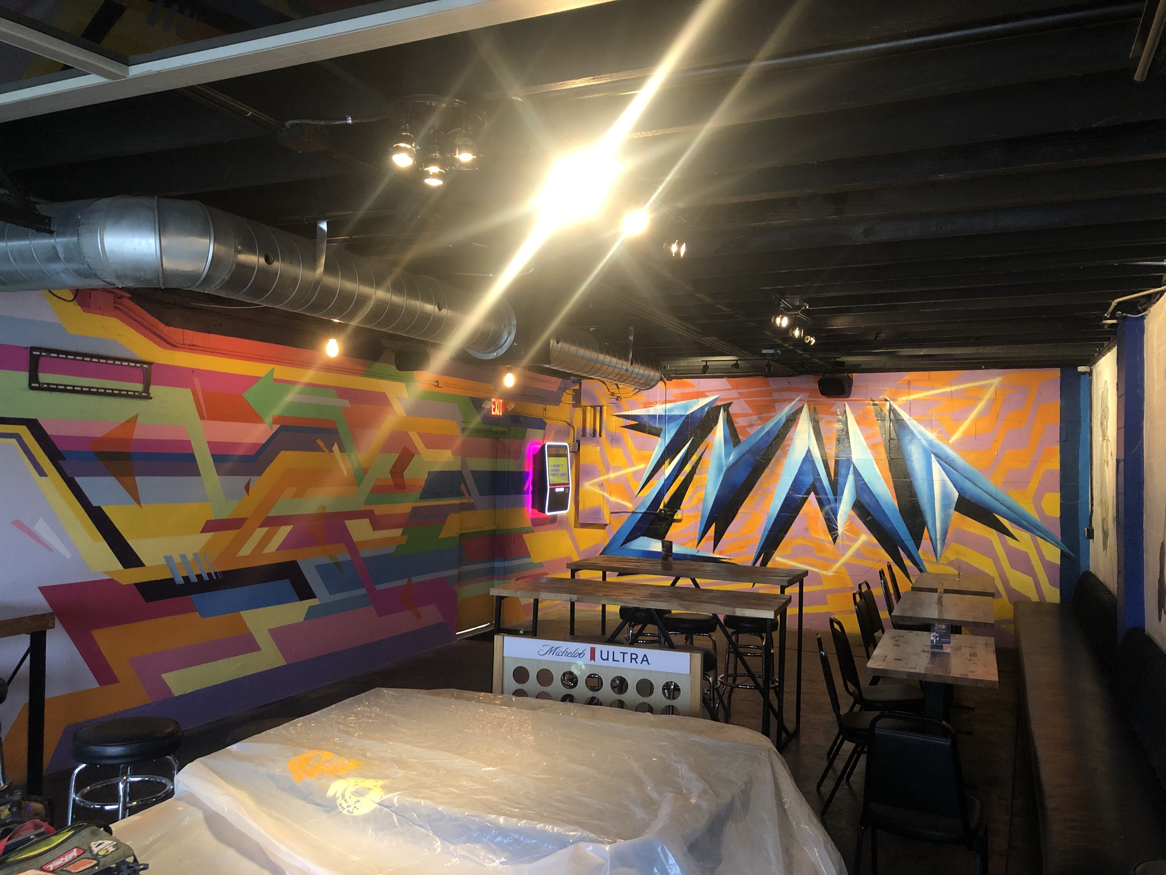 colorful mural with word zuma