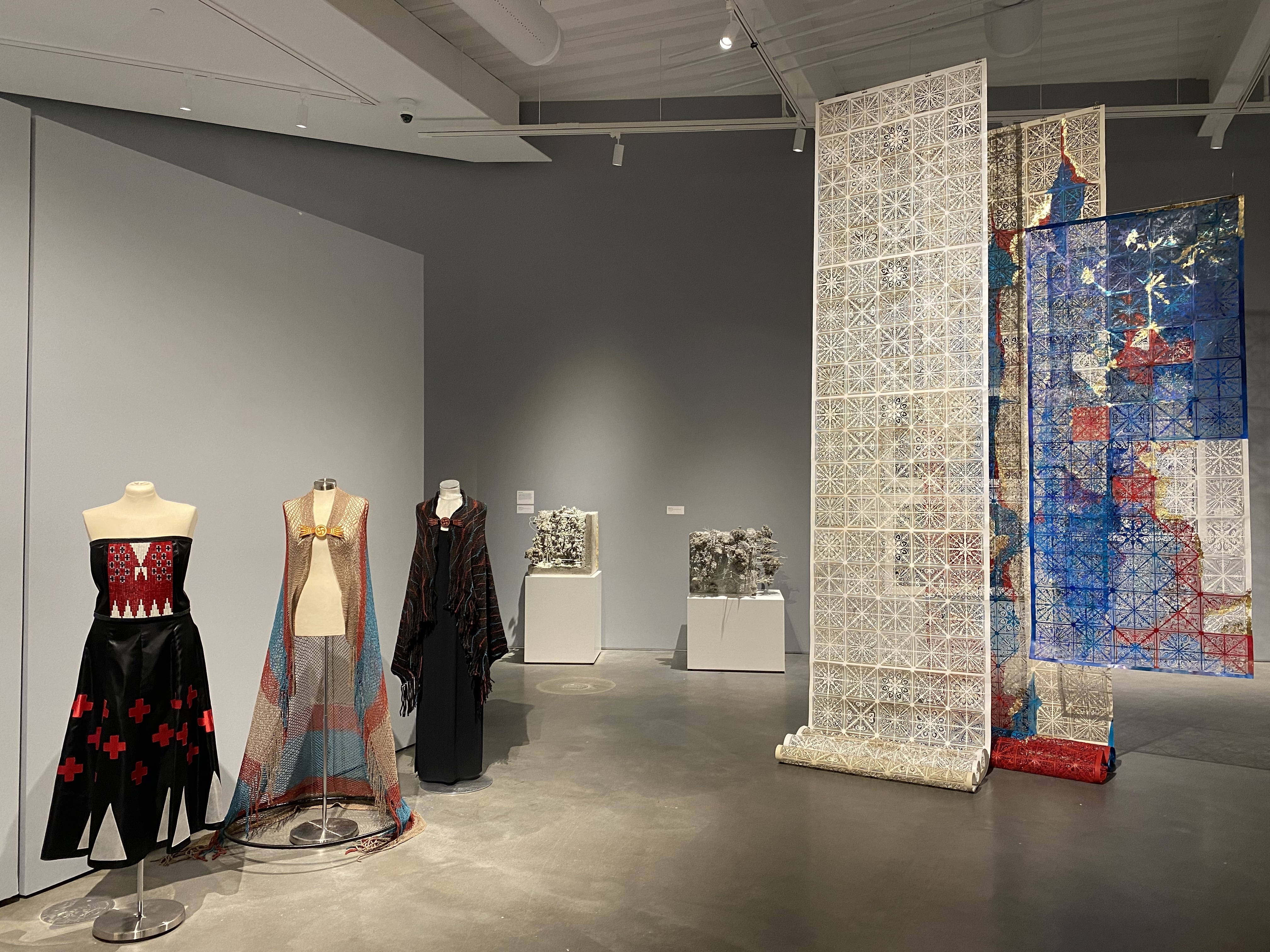 art exhibit of clothing and textiles