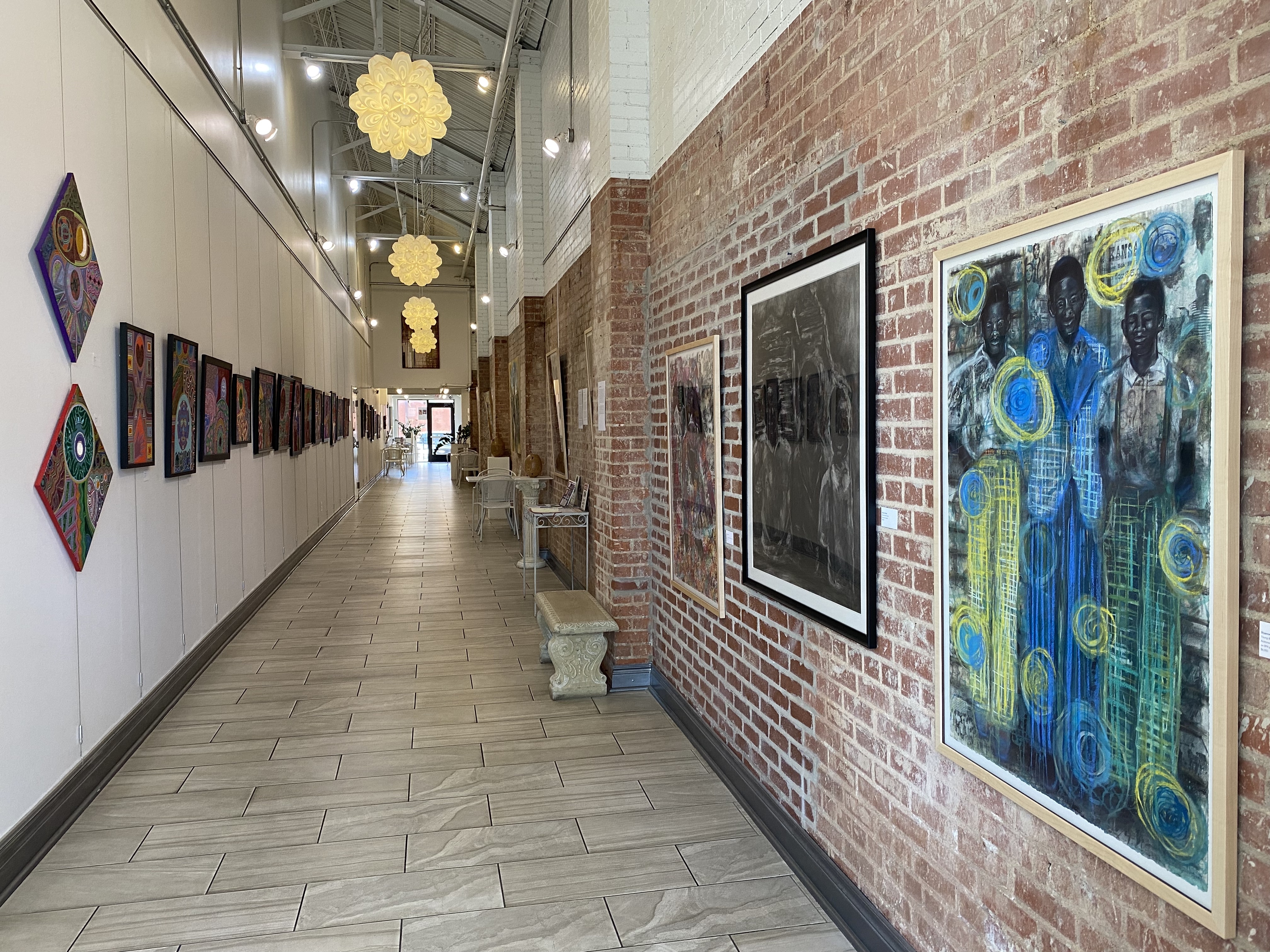 long hallway with art exhibit