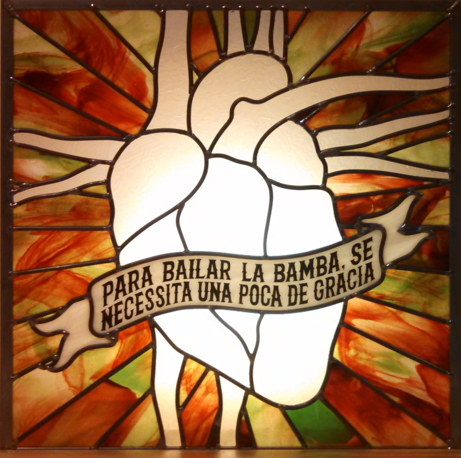 stained glass of real heart with lyrics