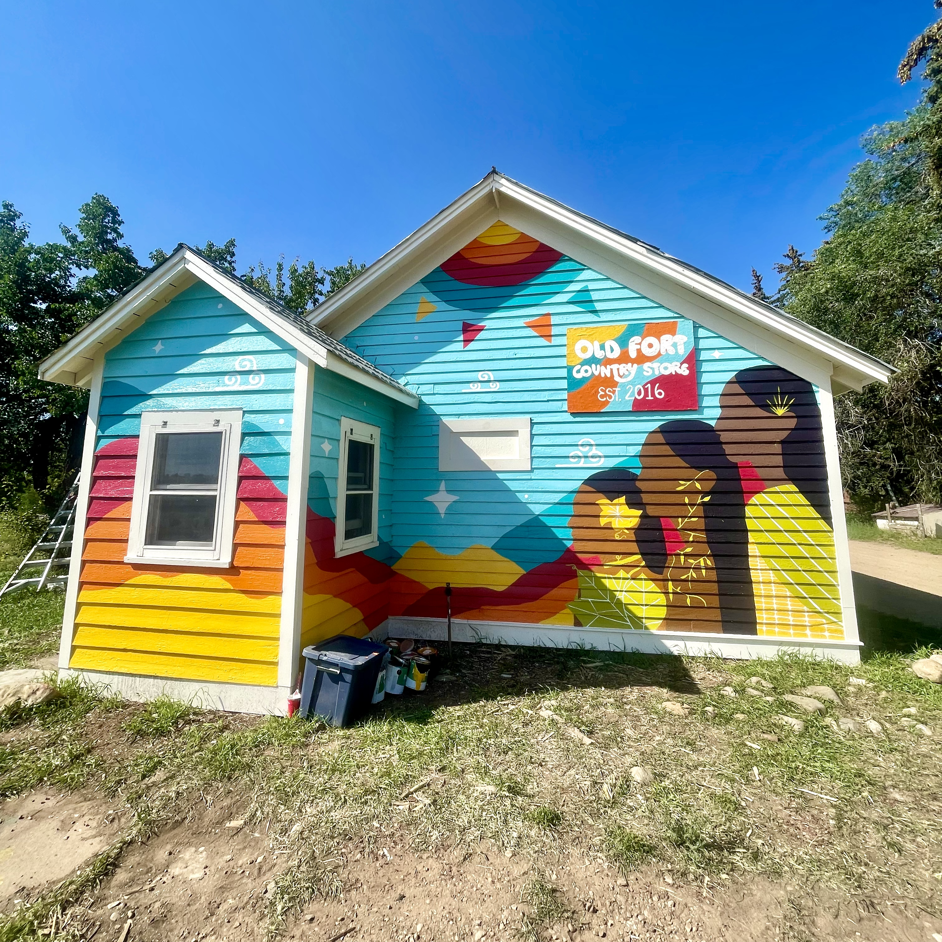 colorful mural on small house/building