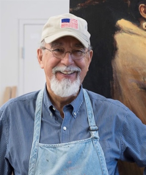 older white man in american flag ballcap with blue apron on
