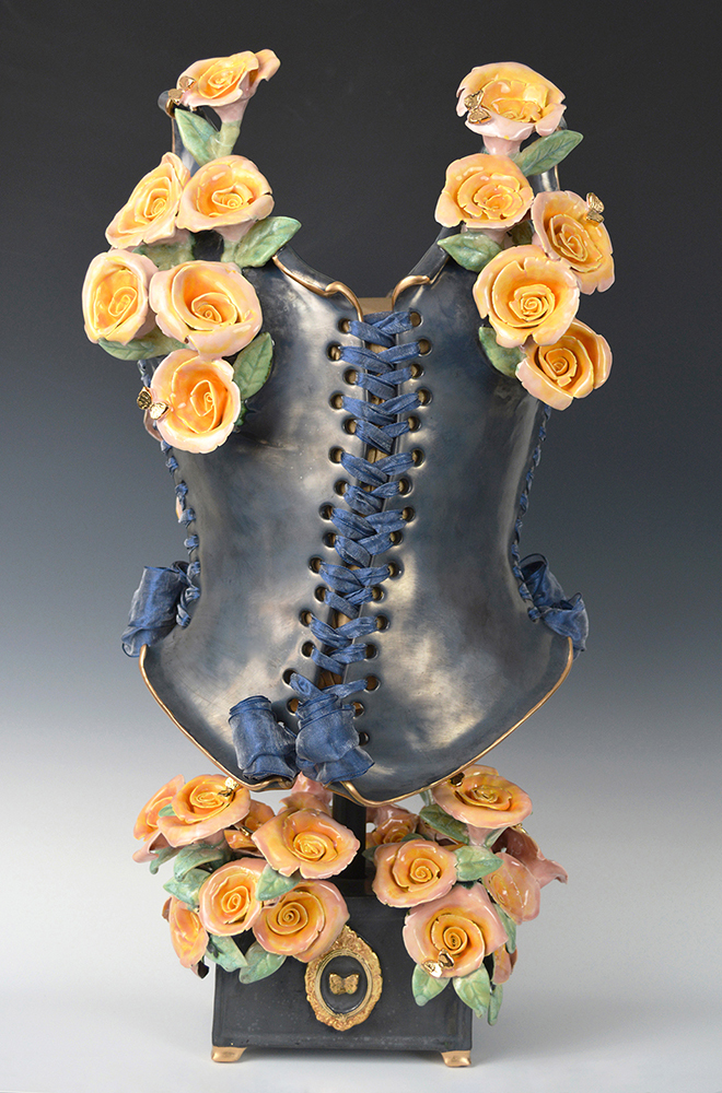 hand sculpted ceramic corset with flowers