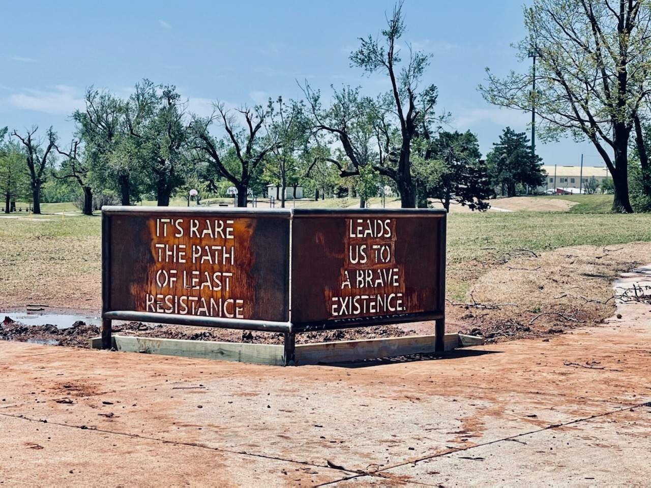 steel sign with poem cut out