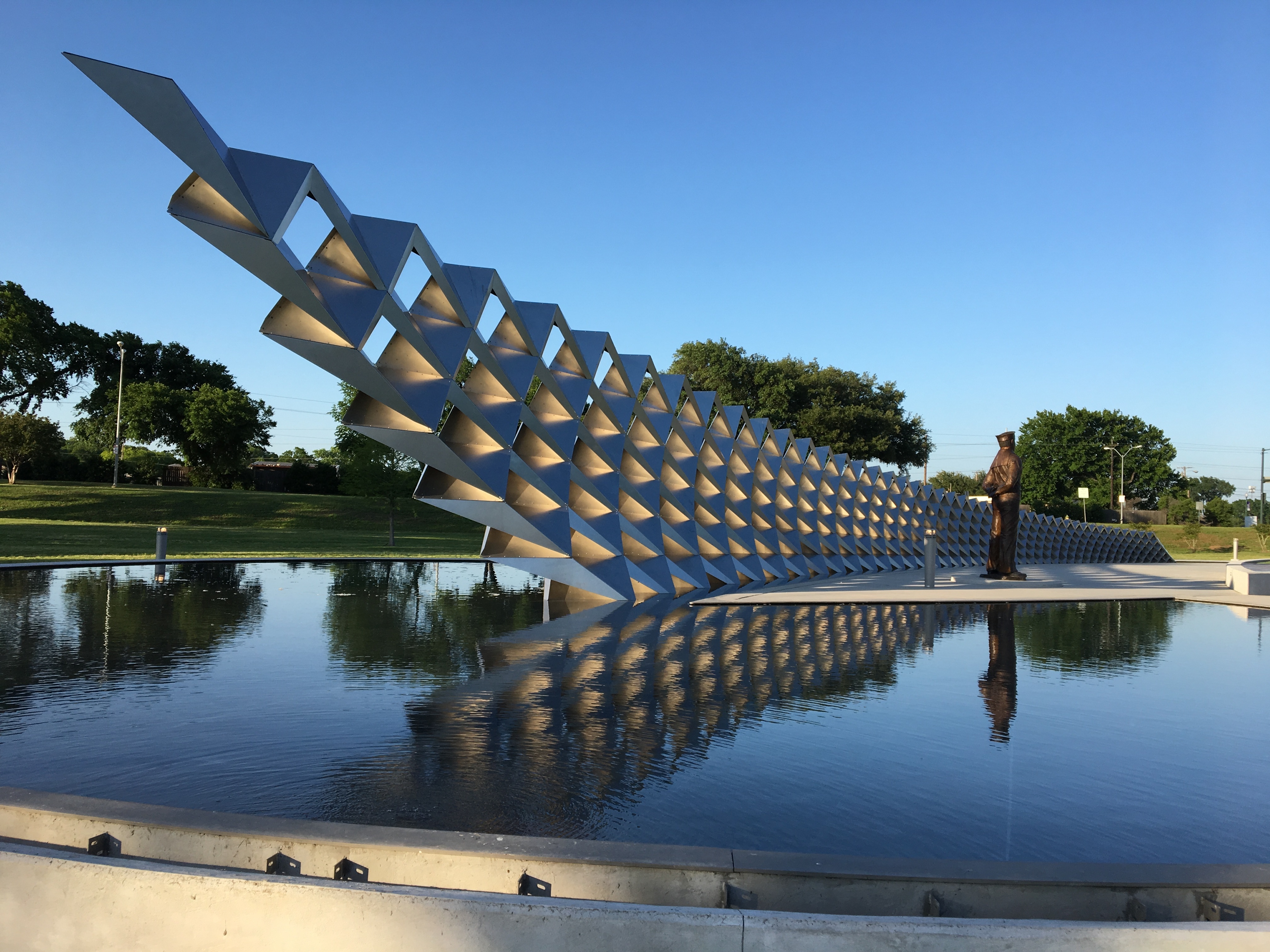 large steel sculpture that looks like links connecting