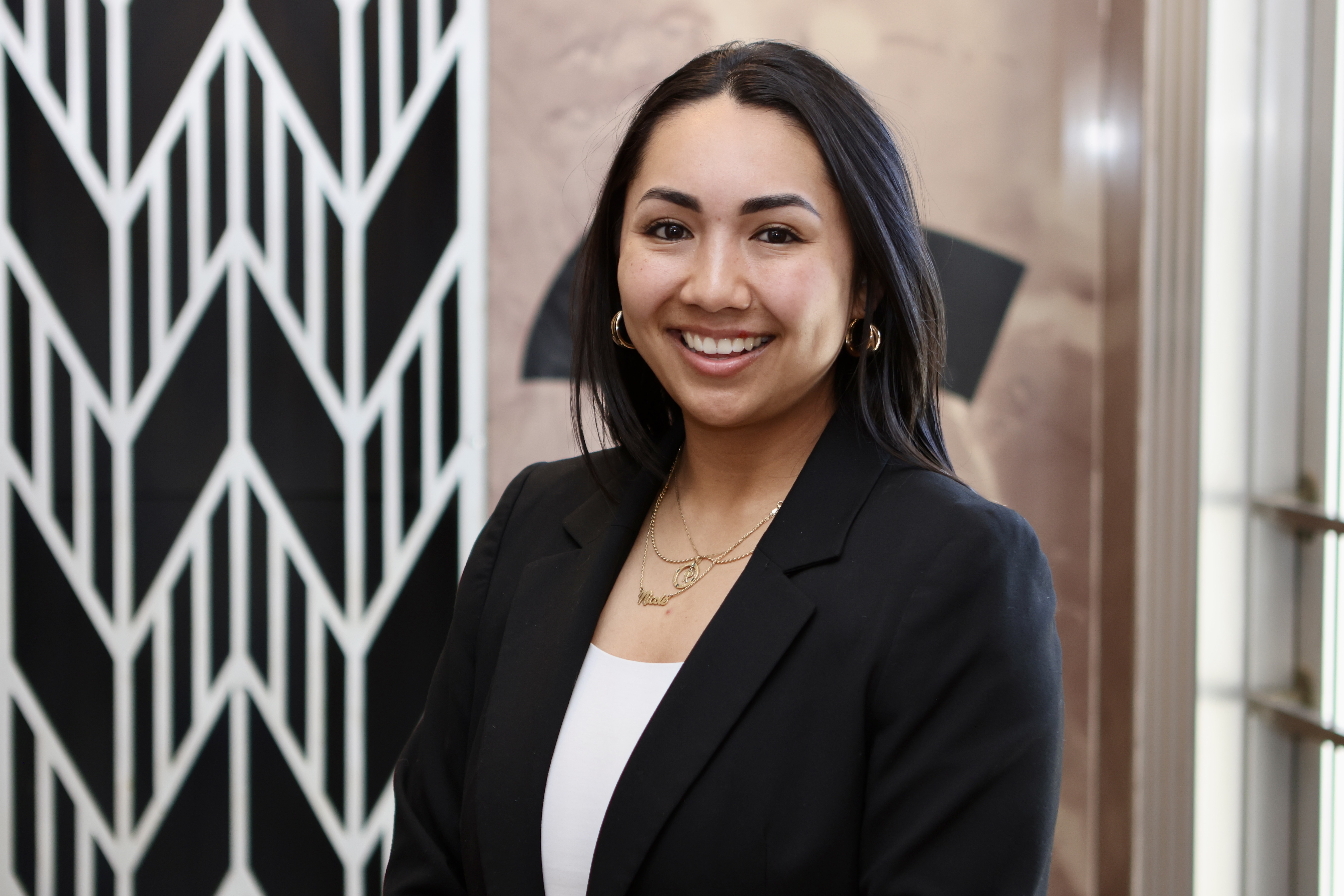 Nicole-Maldonado wearing black jacket with white shirt
