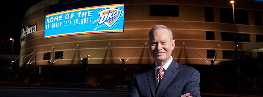 mick-cornett standing in front of downtown arena